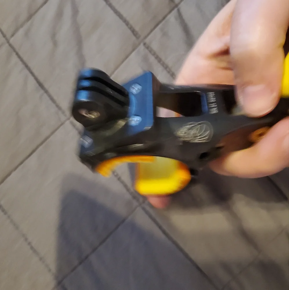 Yellow and Black Camera Tripod Clamp